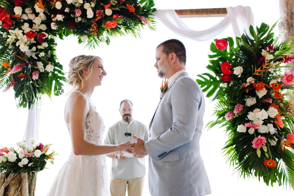 Elegant beachfront wedding with candlelit tables in Tulum